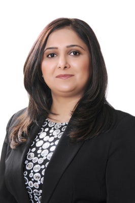 Portrait of Harpreet Gill, Associate.